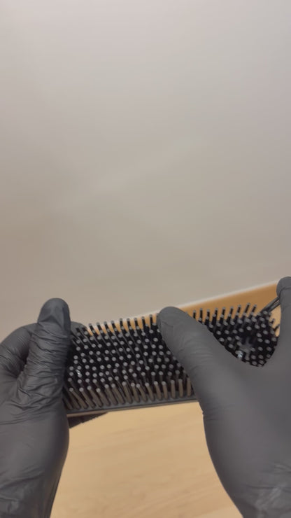 Brosse caoutchouc anti-poils.